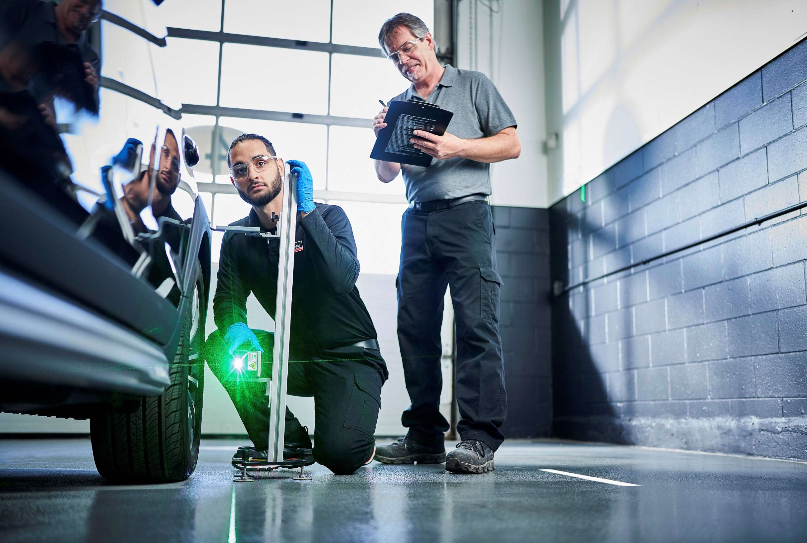 Canadian technician recalibrating a vehicle